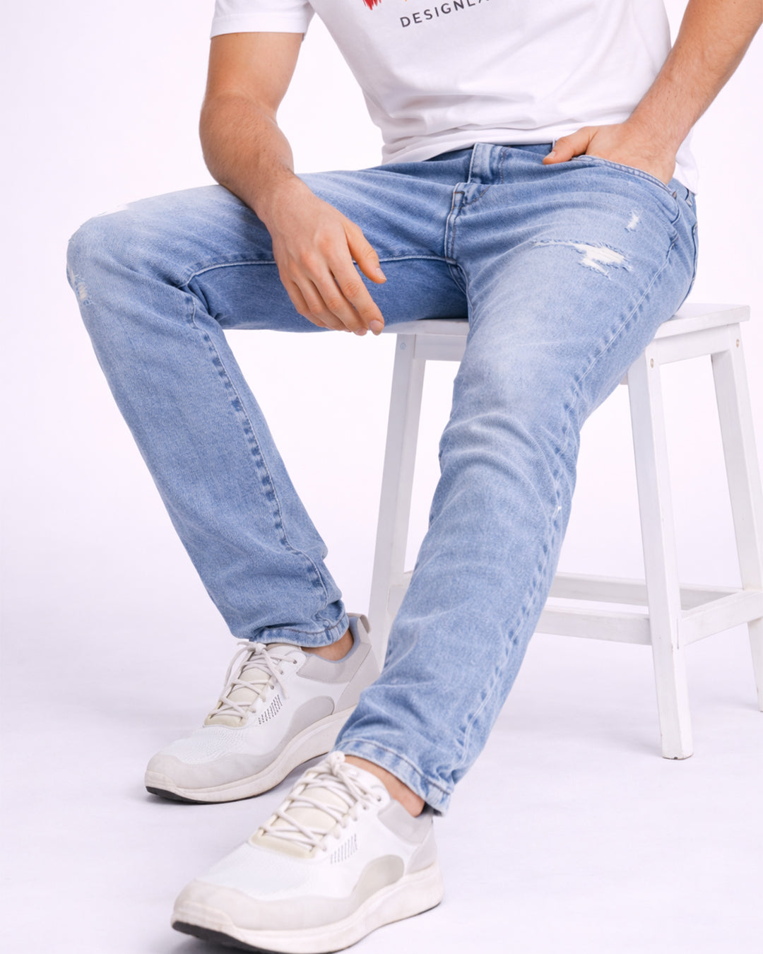 light blue ripped straight fit jeans