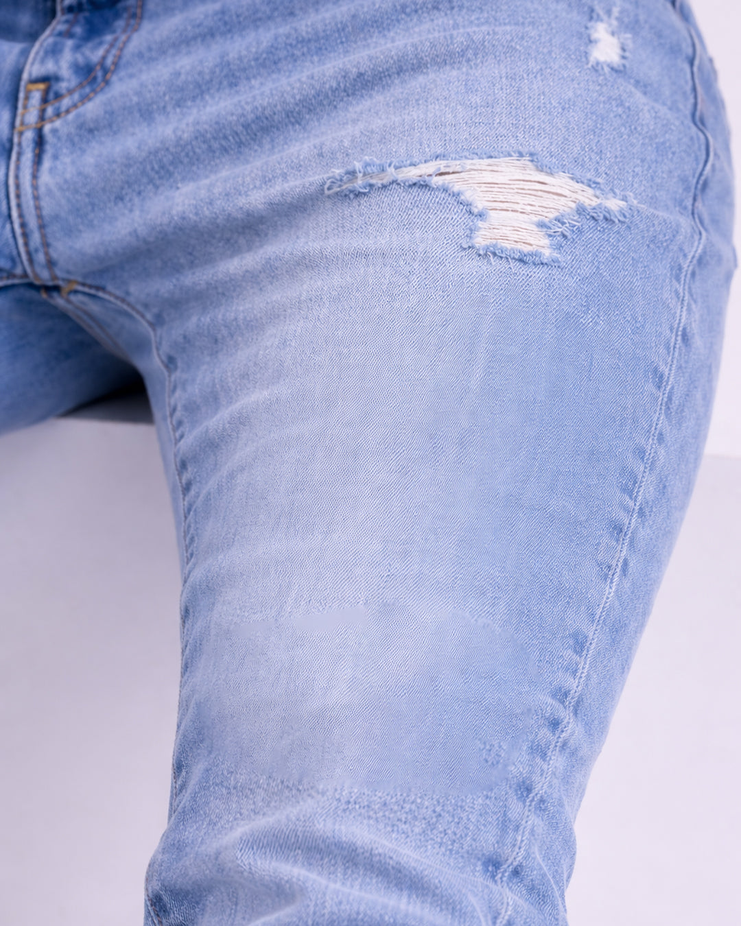 light blue ripped straight fit jeans